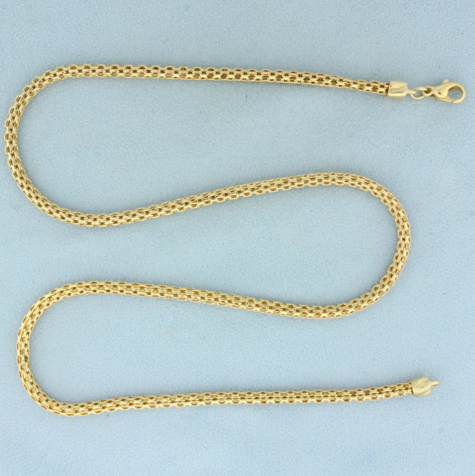 Italian Made 21 Inch Byzantine Link Chain Necklace in: In 14K Yellow Gold. 21 inches long, 3.7mm wide. Lobster clasp. 16.9g.