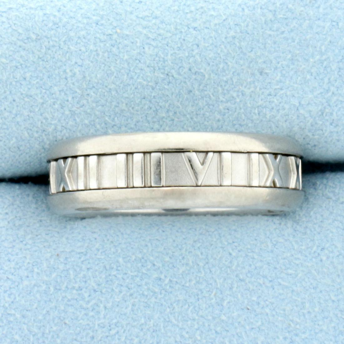 Tiffany & Co Atlas Band Ring in 18K White Gold: In 18K White Gold. 7mm wide. Size 12. 11.1g