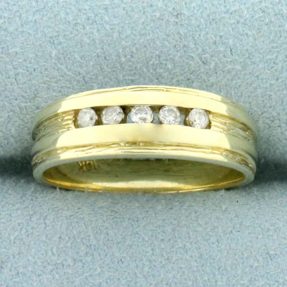 Diamond Wedding or Anniversary Band Ring in 14K Yellow: In 14K Yellow Gold. Contains five high quality .03ct Diamonds, SI clarity/H color. Size 9 1/2. 5.6g