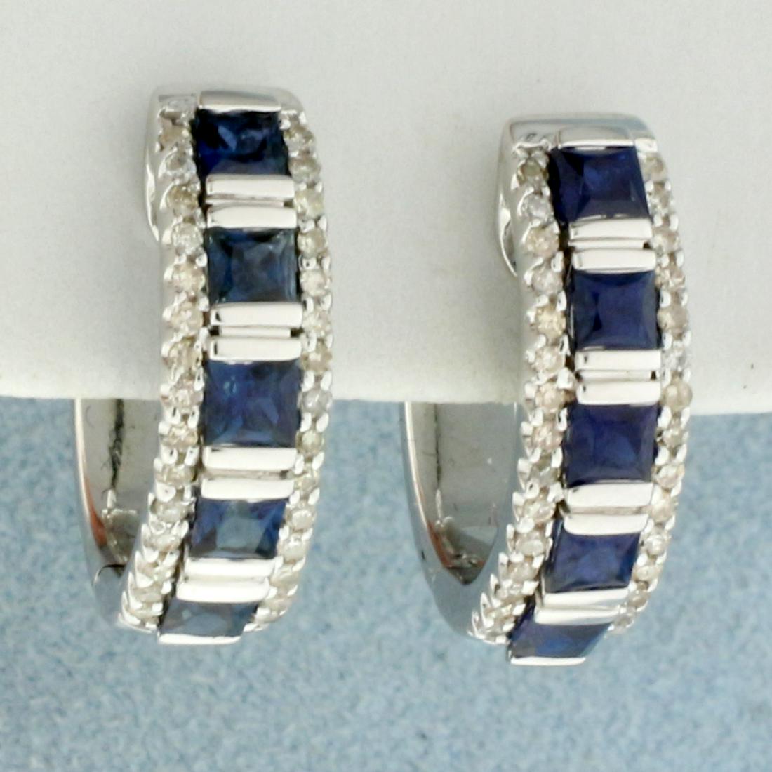Michael C. Fina Sapphire and Diamond Hoop Earrings In: In 14K White Gold. Contains ten AAA quality natural 2.5 mm square Sapphire gemstones with very intense blue color and excellent clarity. Also contains sixty 1/2pt high quality Diamonds. 3/4 inch long.
