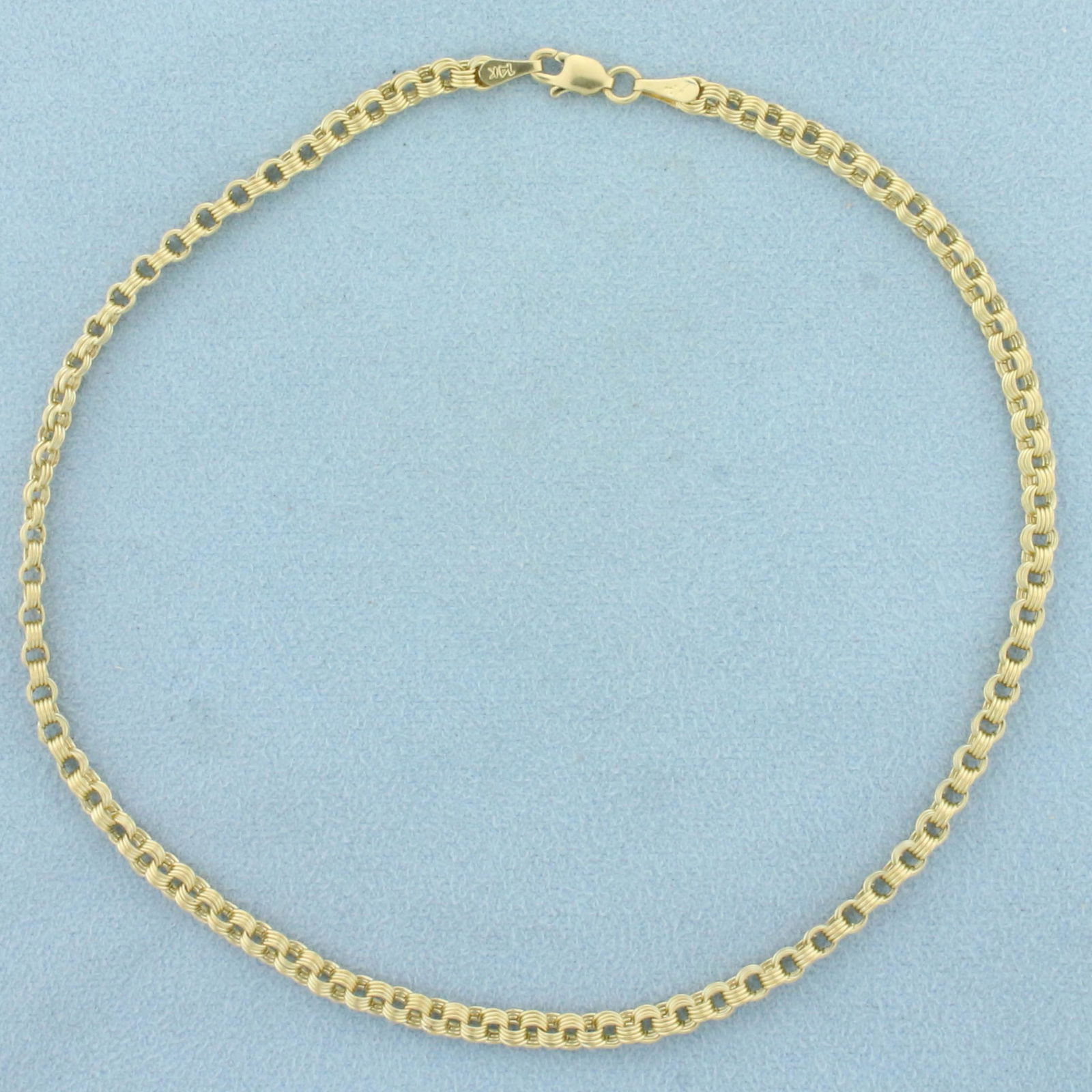 Cable Link Anklet in 14K Yellow Gold: In 14K Yellow Gold. 11 1/4 inch long, 2.8 mm wide. Lobster clasp. 3.2g