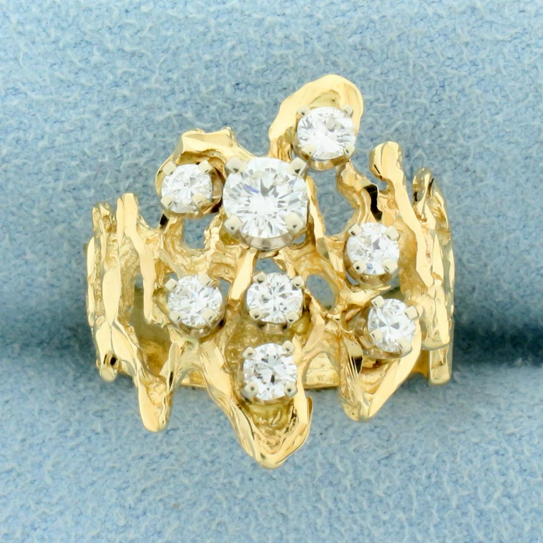 Unique 1ct TW Diamond Ring in 14k Yellow Gold: In 14K Yellow Gold. Contains one .3ct and seven .07 to .1ct high quality Diamonds, VS clarity/H color. Size 7. 5.5g.