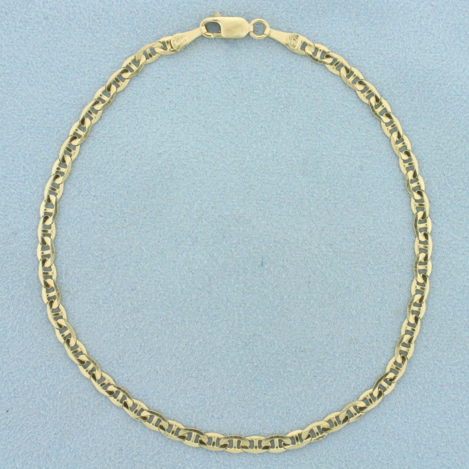 9 Inch Anchor Link Anklet in 14K Yellow Gold: In 14K Yellow Gold. 9 inches long, 3.3mm wide. Lobster clasp. 4.0g.