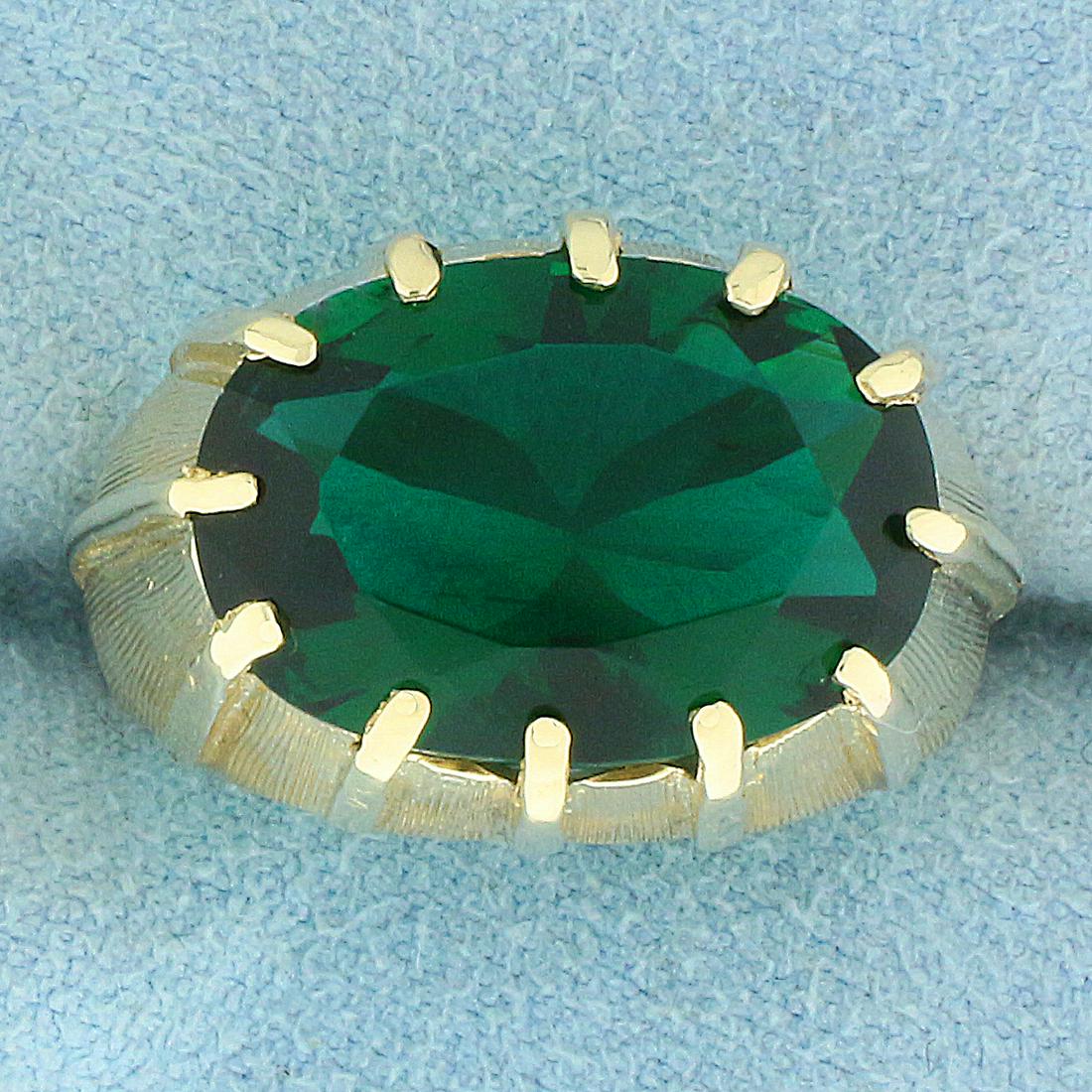 Antique Synthetic Emerald Solitaire Ring in 14K Yellow: In 14K Yellow Gold. Contains a 10ct Synthetic Emerald with intense green color and excellent clarity. Size 7 1/2. 7.0g.
