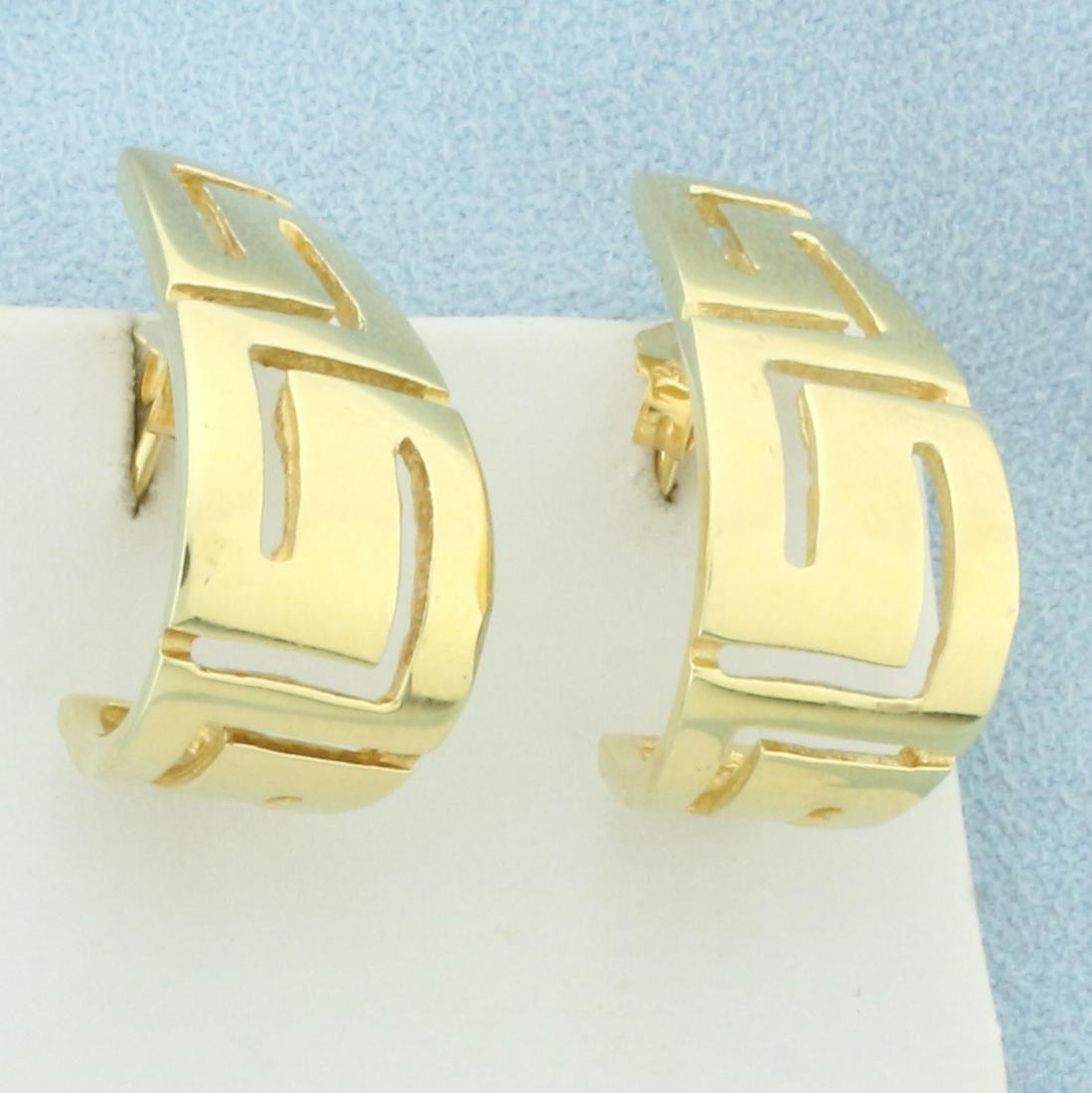 Greek Key Design J Hoop Earrings in 14K Yellow Gold: In 14K Yellow Gold. 1 inch long. 1/2 inch wide. Friction Backs. 11.0g.