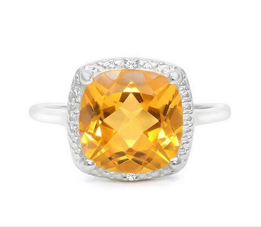 Huge 4CT Cushion Cut Citrine & Diamond Ring in Sterling: Checkerboard cushion cut 4.0ct citrine ring with deep golden color, accented with .01ctw genuine diamonds. Size 7. Set in platinum over sterling silver, 3.7g.