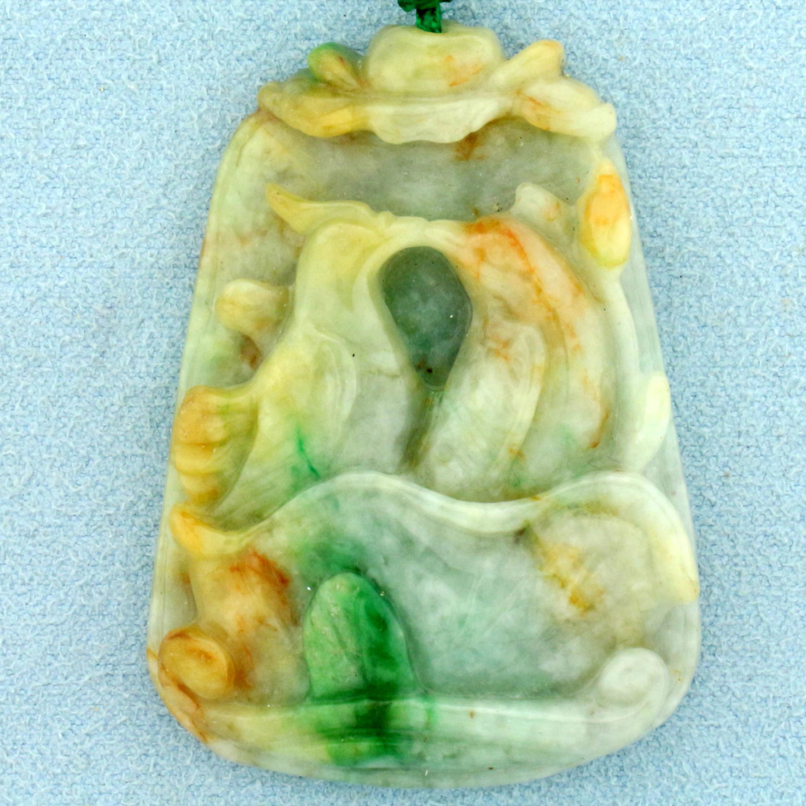 Hand Carved Vintage Chinese Jade Love Birds in Bath: Pendant is 1 7/8 inches long, 1 3/8 inches wide. Beautiful white jade with green overtone and patches of darker green. 27.1g