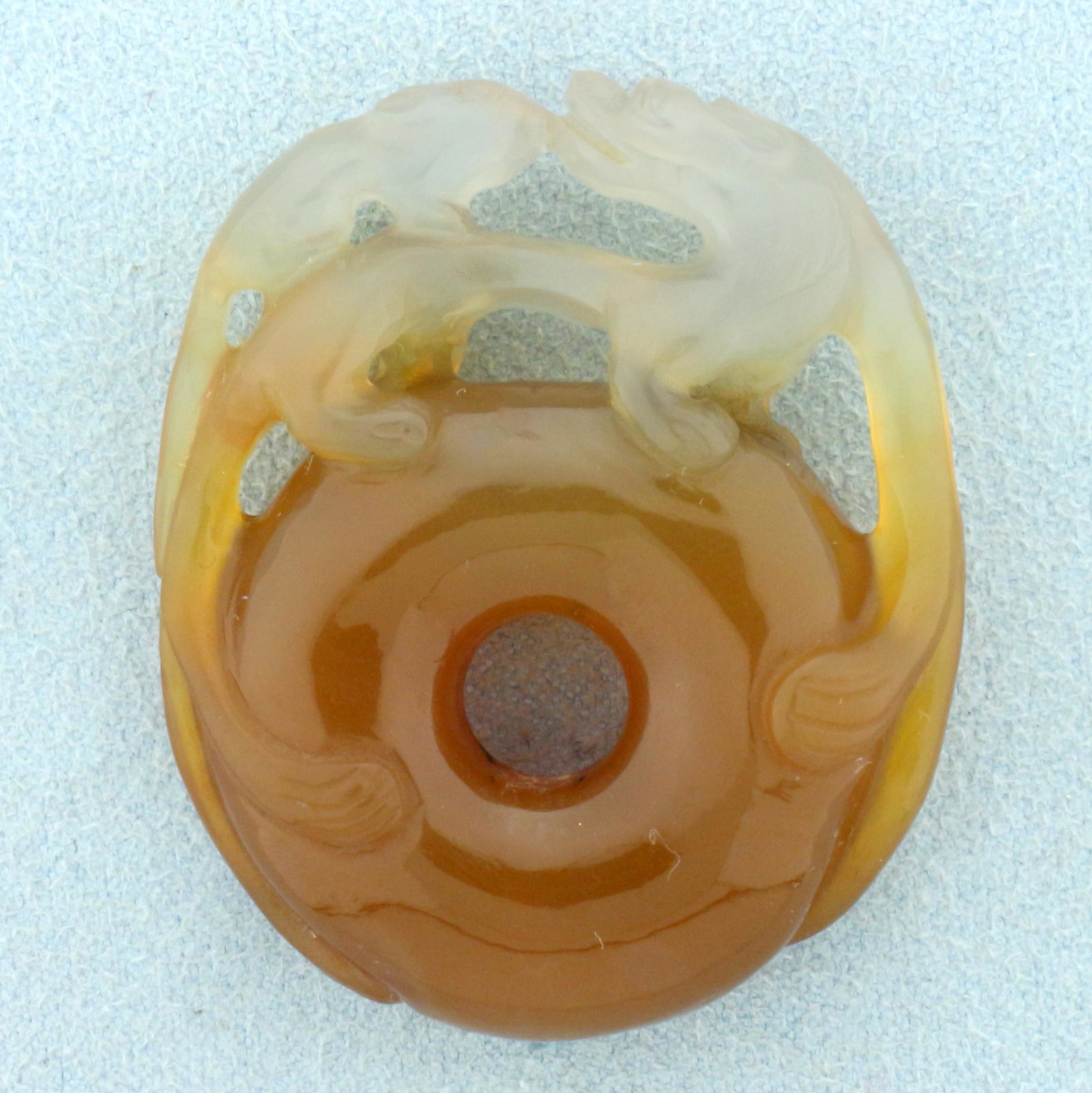 Jade Rat and Dragon Chinese Zodiac Pendant: Beautiful transparent and brown multi-colored hand carved jade. 1 3/4 inch long. 1 1/2 inch wide. 20.4g