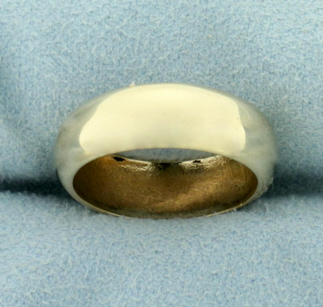 Woman's Traditional Wedding Band Ring in 14k Yellow: In 14k yellow gold. 6.4mm Wide. Size 6 1/2. 5.7g.