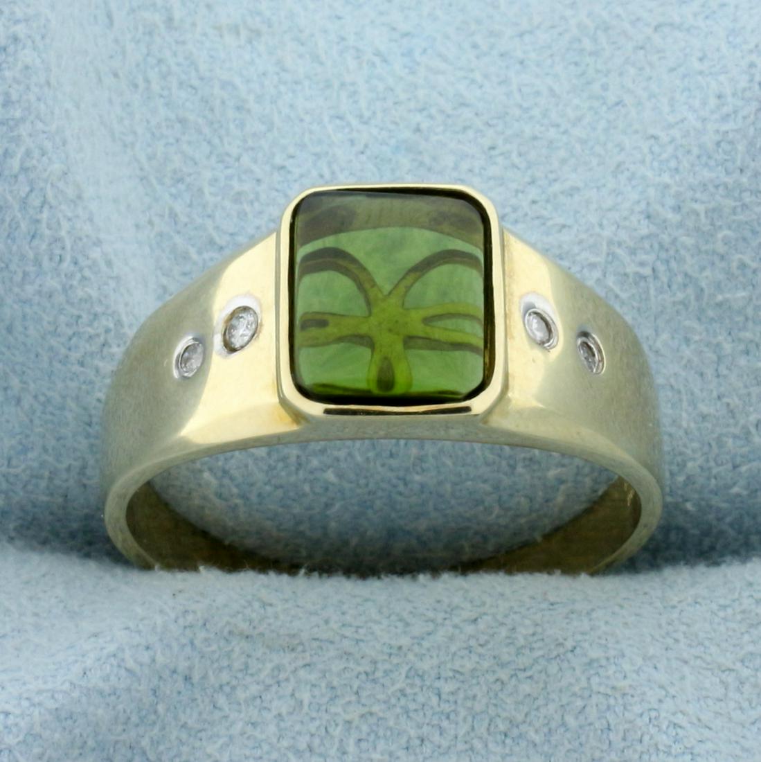 Peridot and Diamond Ring in 10K Yellow Gold: In 10K Yellow Gold. Contains one high quality natural 9x7.5mm Peridot gemstone with excellent clarity and beautiful lime green color. Also contains four high quality .02ct round cut Diamonds, SI clari