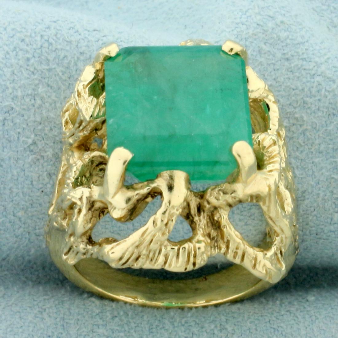 8ct Natural Emerald Solitaire Statement Ring In 14K: In 14K Yellow Gold. Contains one high quality natural 13.1 x 11.5 mm emerald cut Emerald with vibrant green color. Size 7 1/4. 11.9g.