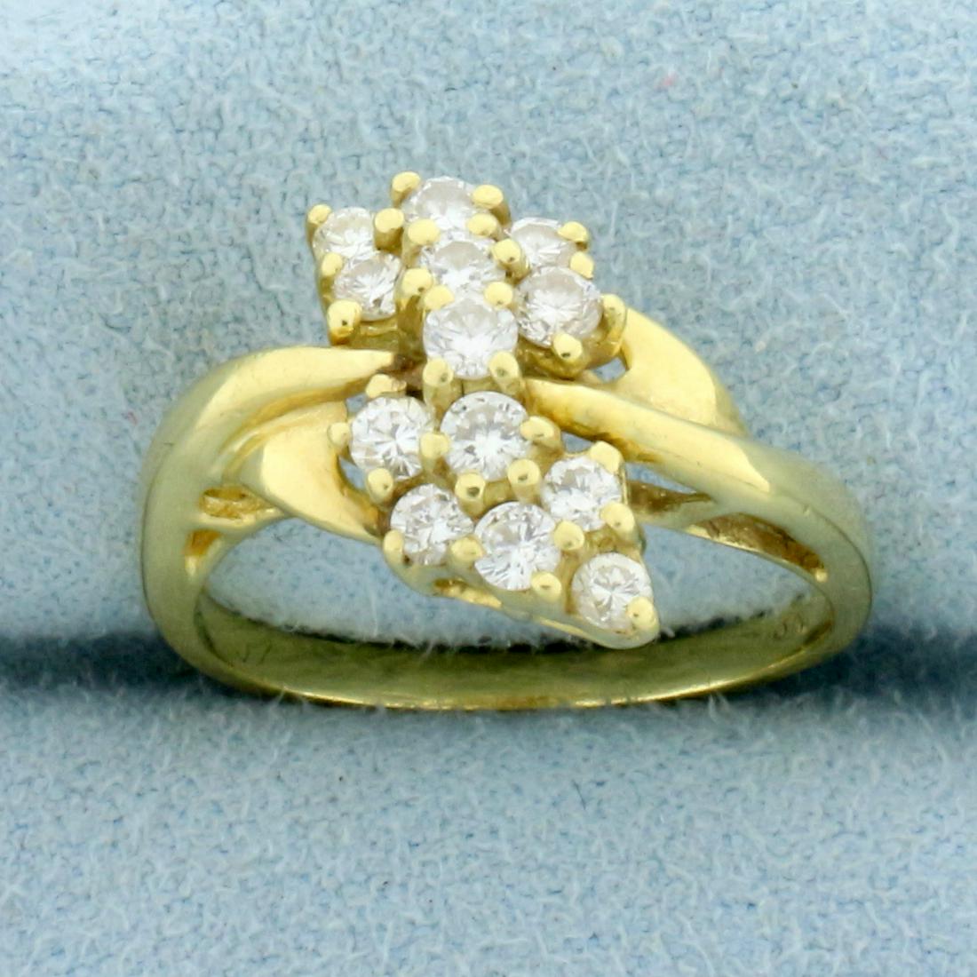 Vintage Diamond Cluster Ring in 18K Yellow Gold: In 18K Yellow Gold. Contains thirteen high quality diamonds ranging from .03ct to .05ct each, 1/2ct TW, VS clarity/H color. Size 5 3/4. 4.2g