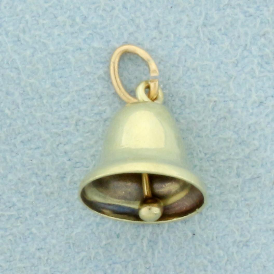 Bell Charm in 14K Yellow Gold: In 14K Yellow Gold. Bell "rings". 3/8 inch long, 3/8 inch wide. 0.7g.