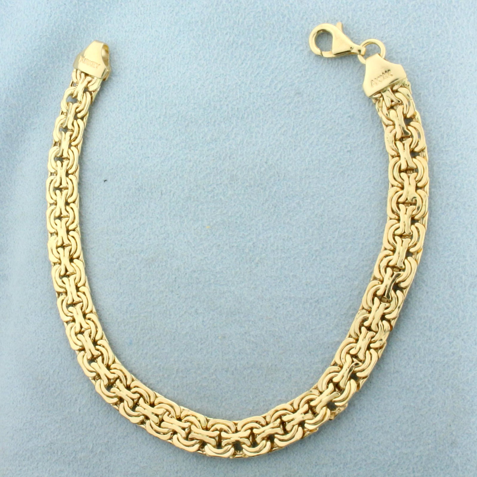 Turkish Made Byzantine Link Bracelet in 14K Yellow Gold: In 14K Yellow Gold. 7 1/2 inches long, 6.9mm wide. Lobster clasp. 6.3g.