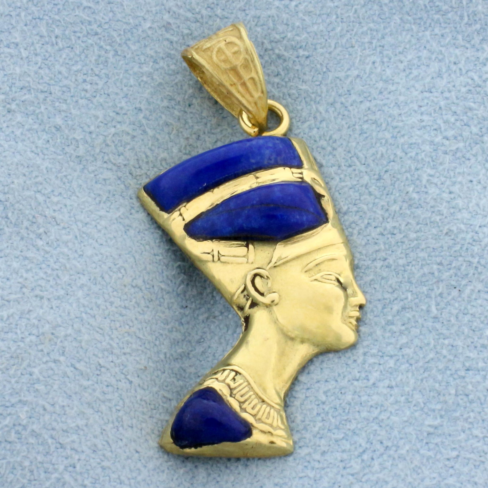Queen Nefertiti Lapis Pendant in 18K Yellow Gold: In 18K Yellow Gold. Contains three high quality natural Lapis Lazuli gemstones with vibrant blue color. 1 1/4 inch long including bale . 2.3g.