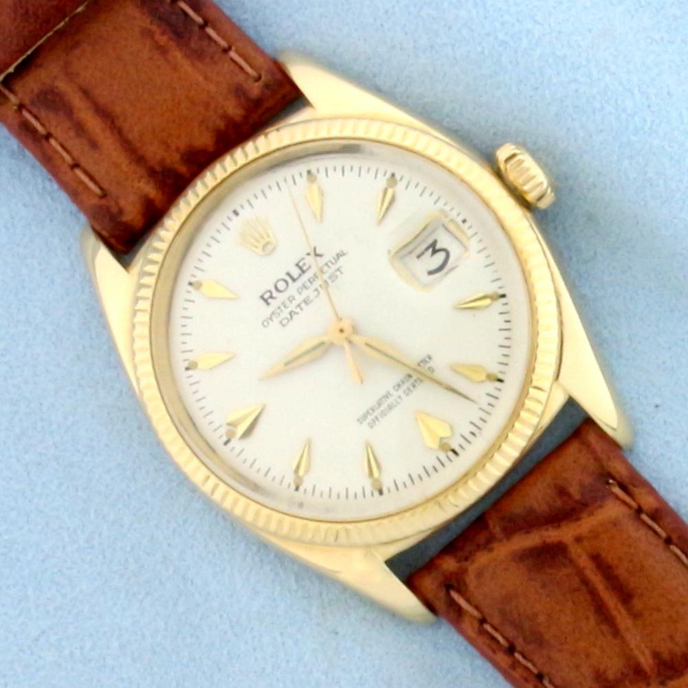 Mens Rolex Datejust 6605 With 18k Gold Case and Bezel: Case and Bezel in solid 18k Yellow Gold. Automatic movement just serviced, runs great. Watch in great condition, no scratching on crystal, minimal scratching on case. Brand new leather band. 34mm case