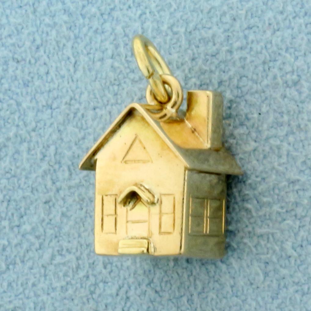 Home Charm or Pendant in 14K Yellow Gold: In 14K Yellow Gold. 1/2 inch long, 1/2 inch wide. 1.8g.