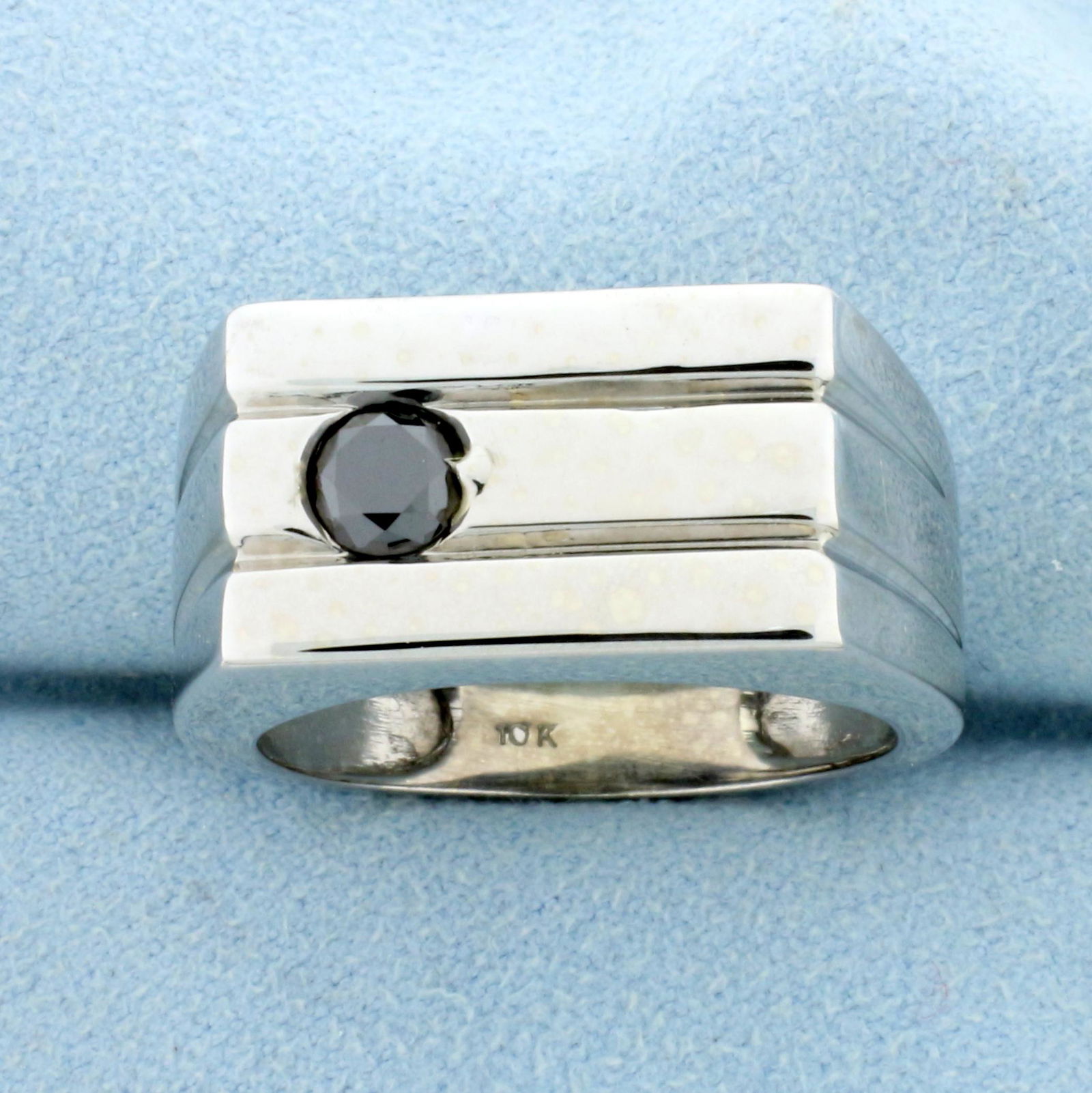 Men's 1/2Cct Black Diamond Ring in 10K White Gold: In 10K White Gold. Contains one high quality natural 1/2ct Black Diamond. Size 11 1/2. 5.7g.