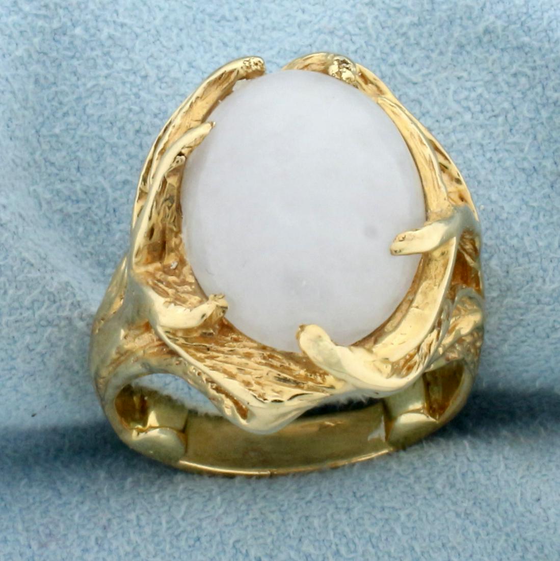 10ct White Jade Solitaire Ring in 14K Yellow Gold: In 14K Yellow Gold. Contains a high quality natural 16x12mm cabochon oval White Jade gemstone with excellent clarirty and high luster. Size 7. 12.6g