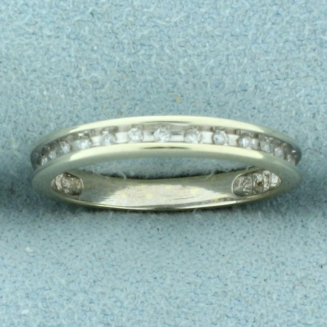 Diamond Wedding Band Ring in 14K White Gold: In 14K White Gold. Contains fourteen high quality 1/2pt Diamonds. Size 5, 2.5mm wide. 1.7g.