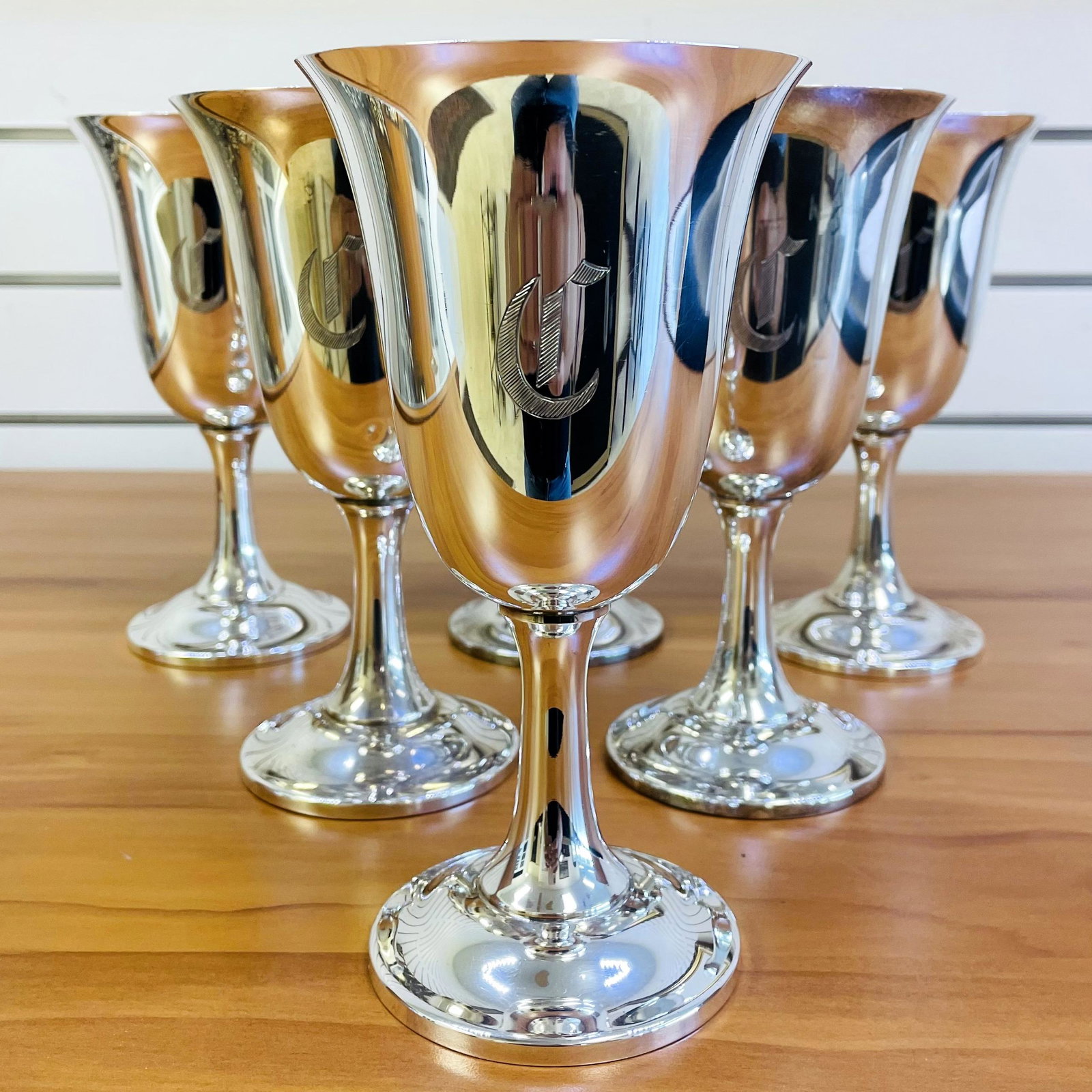 Fisher Silversmiths Water Goblets Set of 6: Solid Sterling Silver. Marked "Fisher" and "62". 6.5 inches tall, 3.5 inch diameter of rim. Hand engraved with a "C", excellent conditions with a few minor imperfections. 964g.