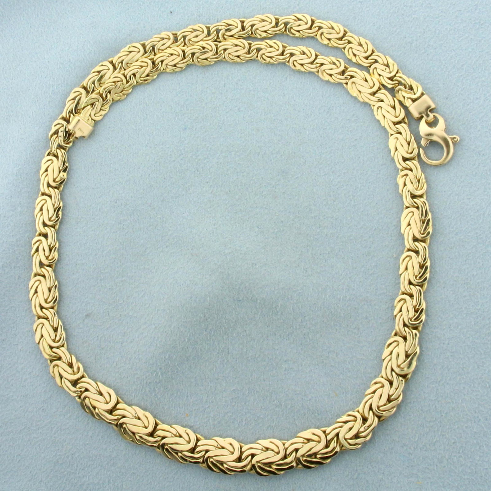 Italian Made Graduated Byzantine Link Chain Necklace in: In 14K Yellow Gold. 17 inches long, Graduated width - 6.3- 9.1mm wide. Lobster clasp. 18.2g.