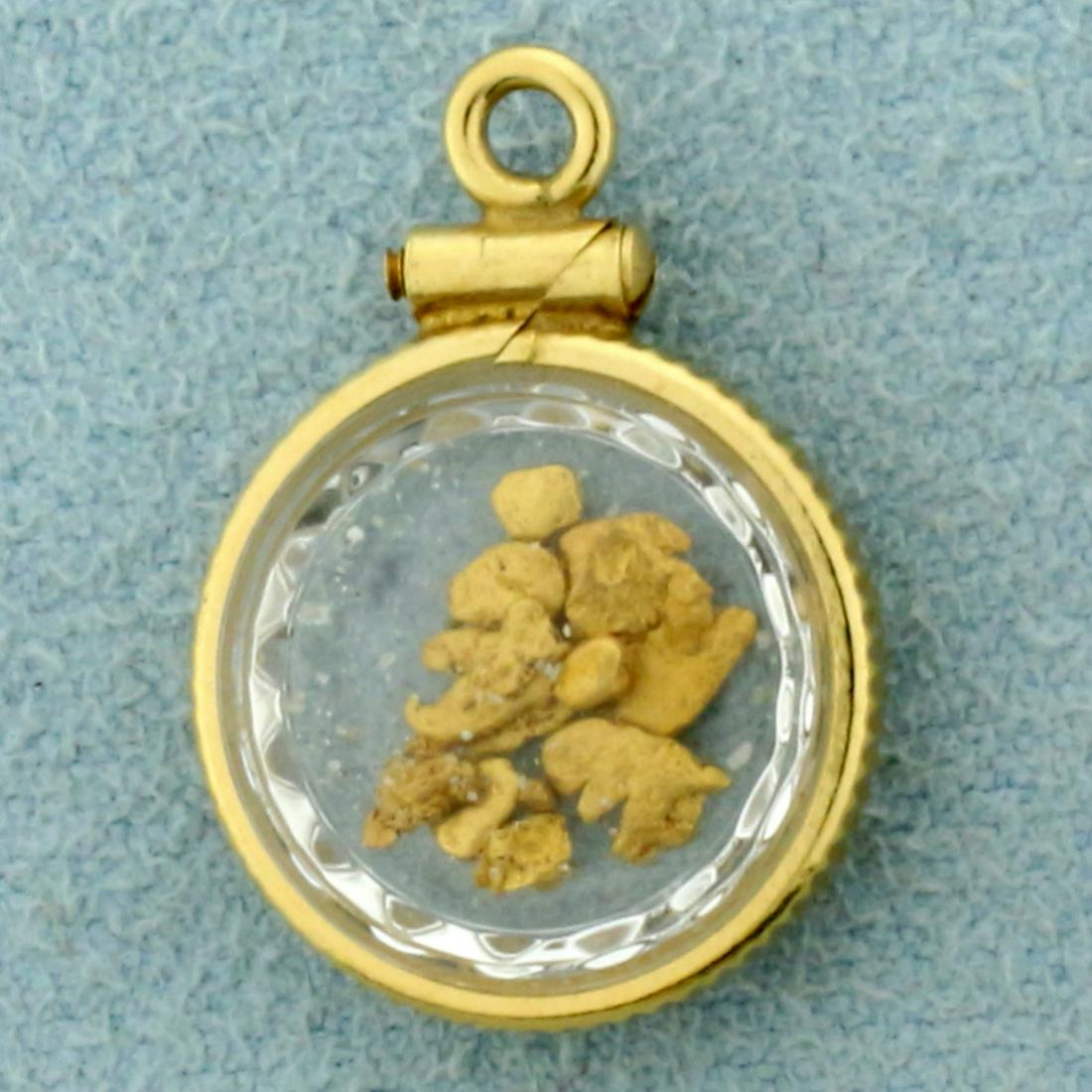 Gold Flake Pendant in 14K Yellow Gold: In 14K Yellow Gold Pendant, Flakes are 24k Pure Gold. 3/4 inch long including bale, 1/2 inch wide. 1.3g.