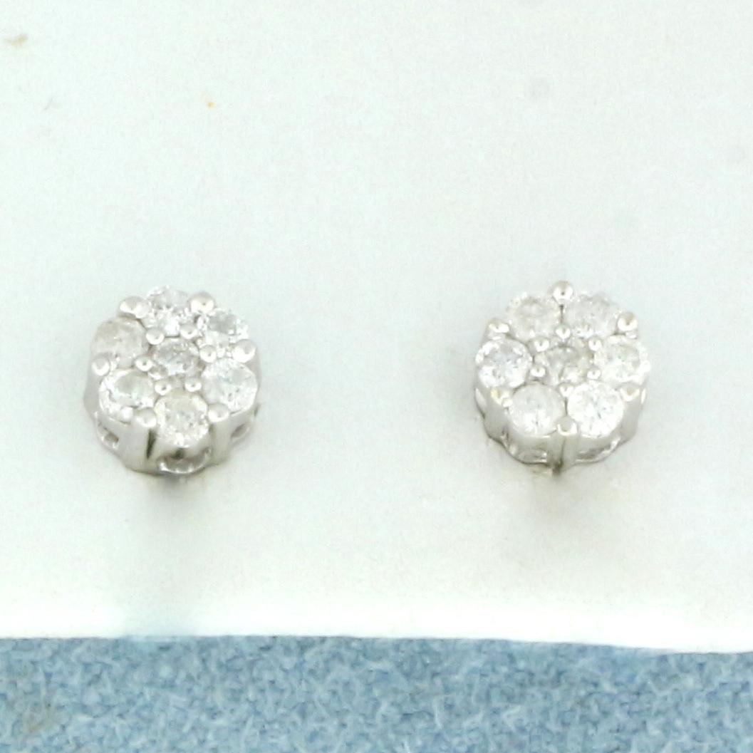 Diamond Cluster Stud Earrings in 14k White Gold: In 14k white gold. Contains fourteen high quality diamonds, 1/3ct TW, G color/I clarity. Diamonds are cluster set to give the illusion of large 1ct TW diamond earrings. Screw backs for added security.