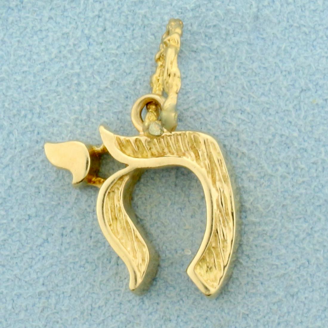 Hebrew Chai Good Luck Pendant in 14K Yellow Gold: In 14K Yellow Gold. 1 inch long including bale. 3.6g.