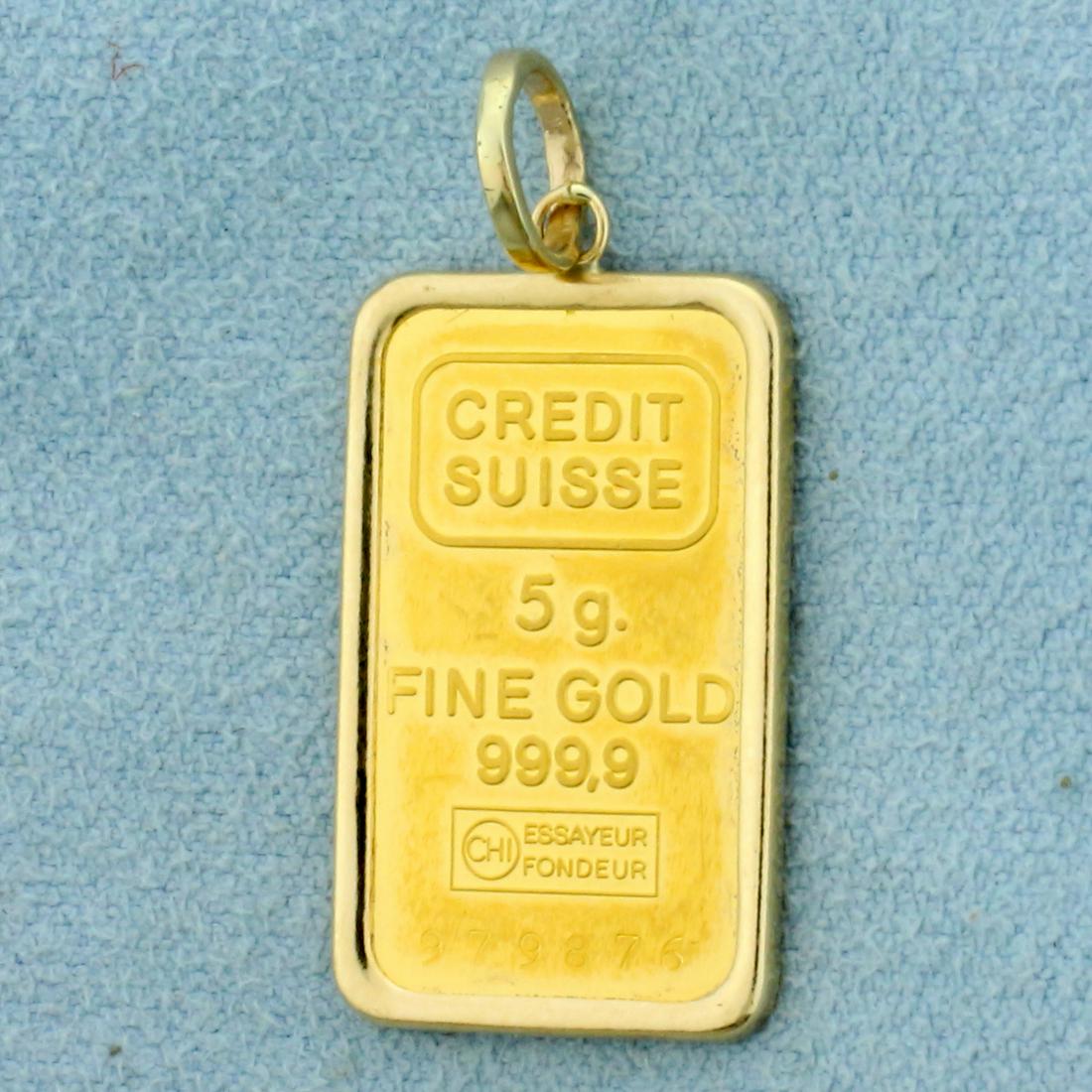 Credit Suisse Gold Bar Pendant in 14K Yellow Gold Bezel: In 14K Yellow Gold Bezel. Contains a .9999 pure 5g gold bar. 1 1/4 inches long, 1.5mm wide. 5.6g.