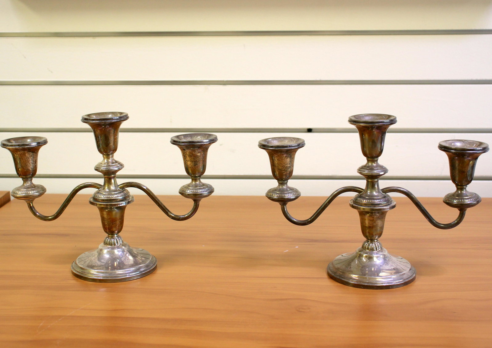 Two Vintage Revere Sterling Silver Candelabra: In Sterling Silver, weighted. Contains Two, Three arm candelabra. 7 1/2 inches high. 1663.7g.