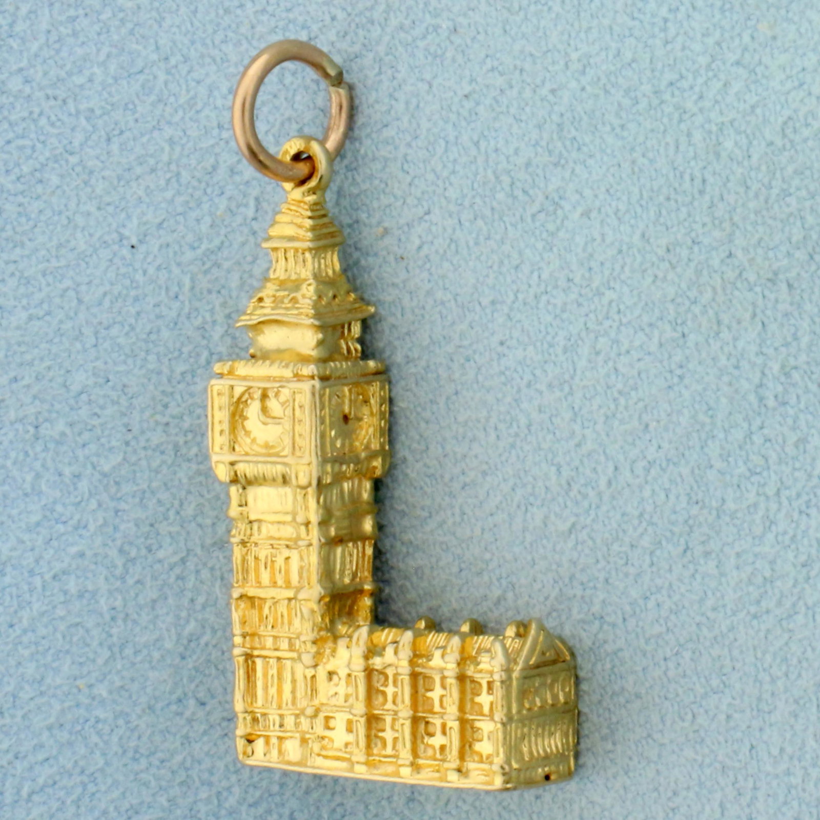 Big Ben Clock Pendant or Charm in 8K Yellow Gold: In 8K Yellow Gold. 1 1/2 inches long including bale. 5/8 inch wide. 7.5g