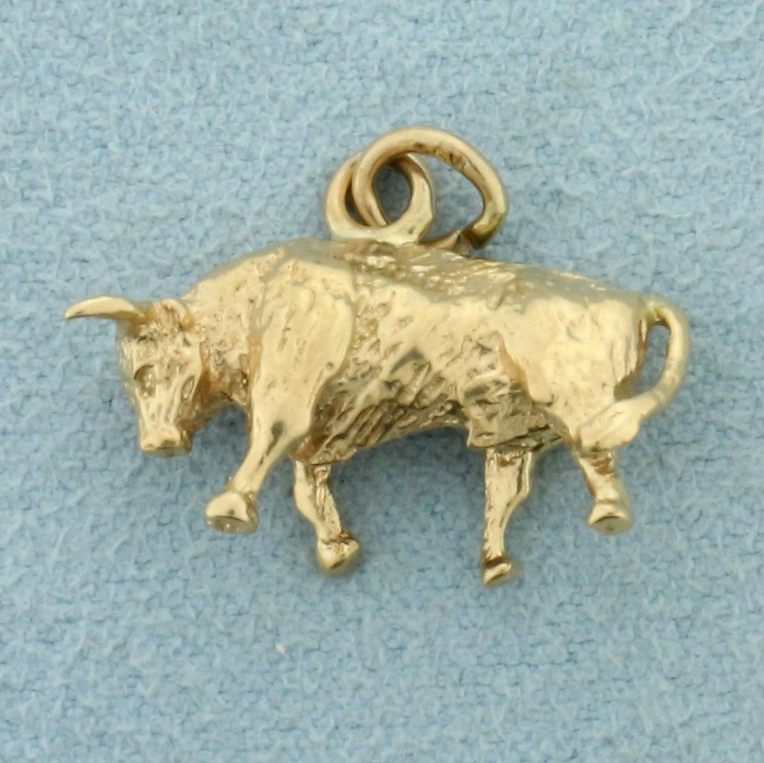 Bull Pendant in 14K Yellow Gold: In 14K Yellow Gold. Pendant is solid gold, not hollow. 3/4 inch long. 4.1g