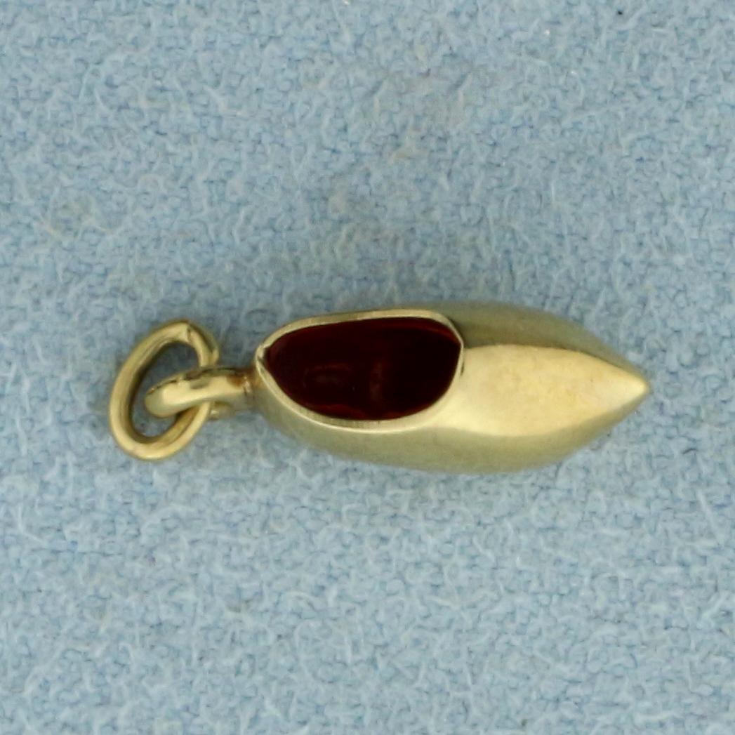 Shoe Clogs Charm or Pendant in 14k Yellow Gold: In 14k yellow gold. 3/4 inch long with bale. 0.7g