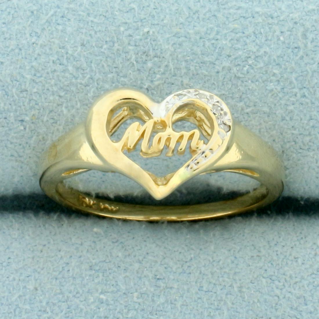 Diamond "Mom" Heart Ring in 10k Yellow Gold: In 10K Yellow Gold. Contains four high quality 1/2pt Diamonds. Size 6. 2.2g.