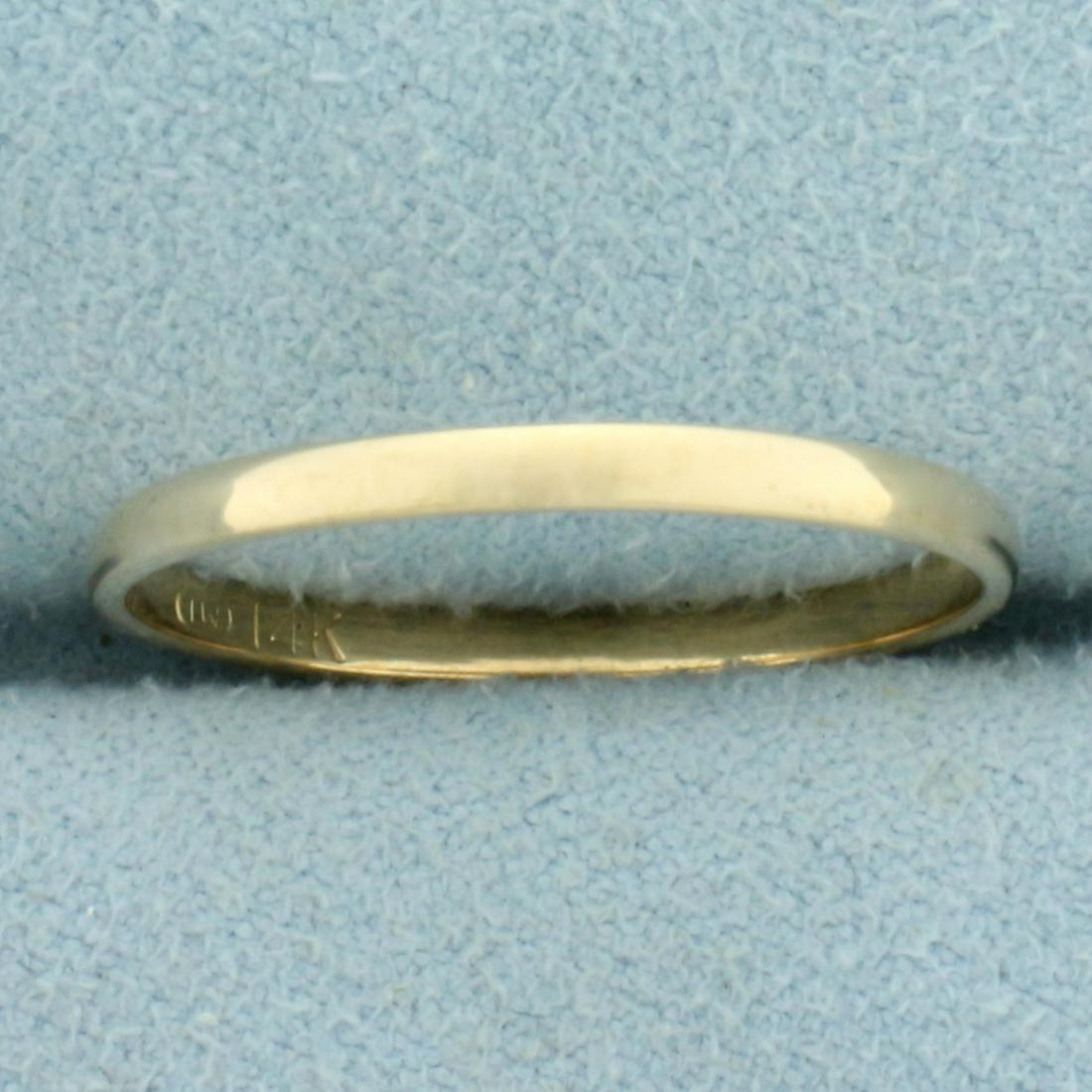 Thin Wedding Band Ring in 14K Yellow Gold: In 14K Yellow Gold. Size 9 1/4, 2mm wide. 1.3g.