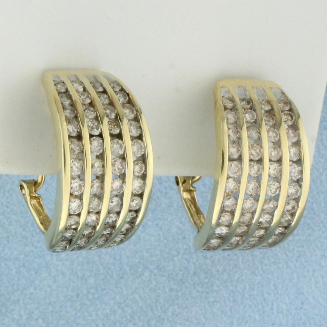 Diamond Crescent Half Hoop Earrings in 10K Yellow Gold: In 10K Yellow Gold. Contains Ninety six high quality diamonds, 1ct TW, M color/I clarity. 3/4 inch long, 3/8 inch wide. French Omega backs with post for pierced ears. 7.7g.