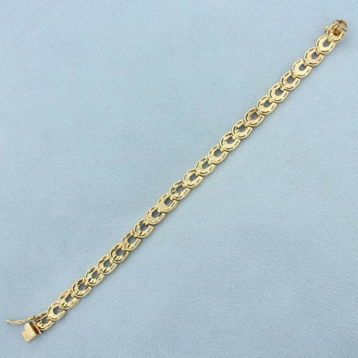 Diamond Cut Horseshoe Link Bracelet in 14K Yellow Gold (13317) on Mar