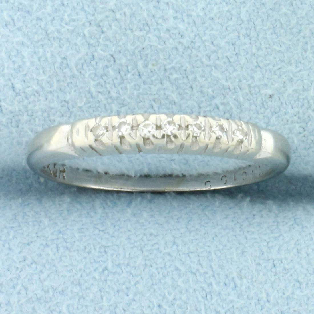 Diamond Wedding or Anniversary Band Ring in 14K White Gold: In 14K White Gold. Contains seven high quality 1/2pt Diamonds. Size 5 1/2. 1.4g.