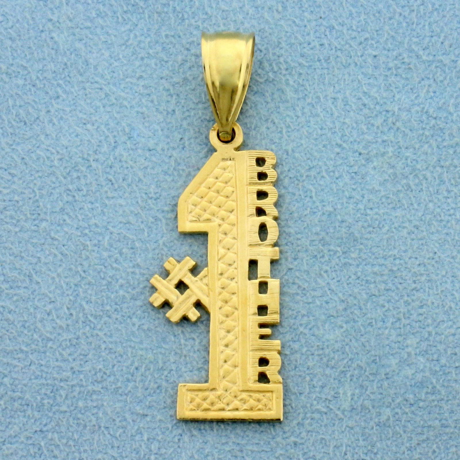Number One Brother Pendant in 14K Yellow Gold: In 14K Yellow Gold. 1 1/2 inches long including bale, 10mm wide. 3.0g.