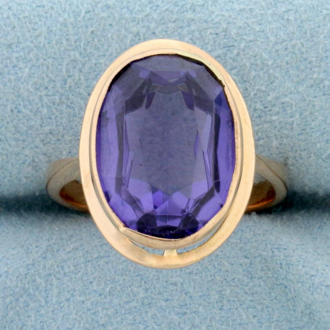 Vintage 9ct Sapphire Solitaire Statement Ring in 14K Rose Gold: In 14K Rose Gold. Contains one high quality natural 9ct 15x11mm oval cut Purple Sapphire gemstone with vibrant purple color and excellent clarity. Size 6 1/2. 6.0g