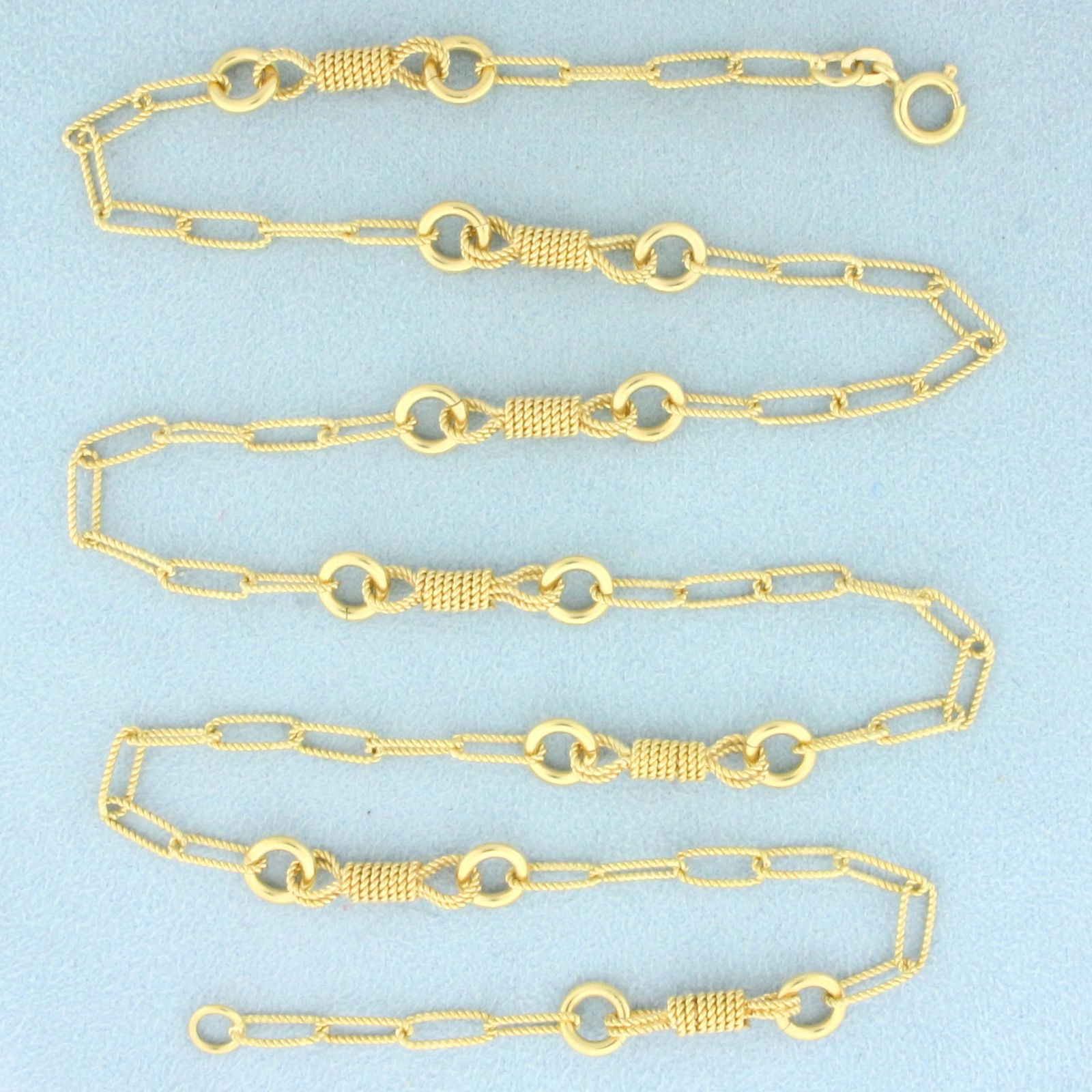 24 Inch Fratelli Chini Designer Elongated Cable Link Necklace in 18K Yellow Gold: In 18K Yellow Gold. Spring clasp. 24 inches long. 5mm wide. 22.9g