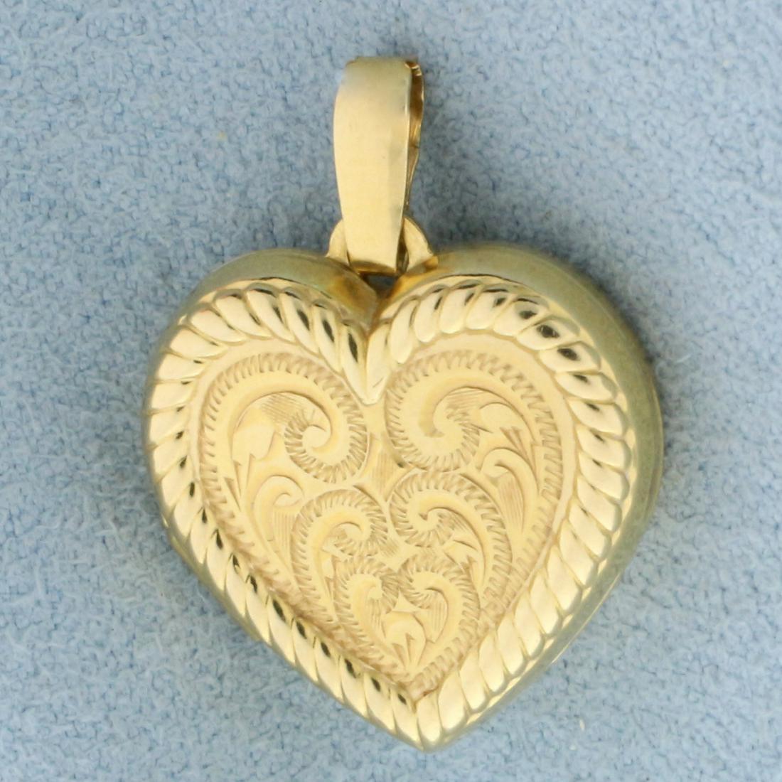 Vintage Heart Locket Pendant in 14K Yellow Gold: In 14K Yellow Gold. 1 inch long, 3/4 inch wide. 2.3g.