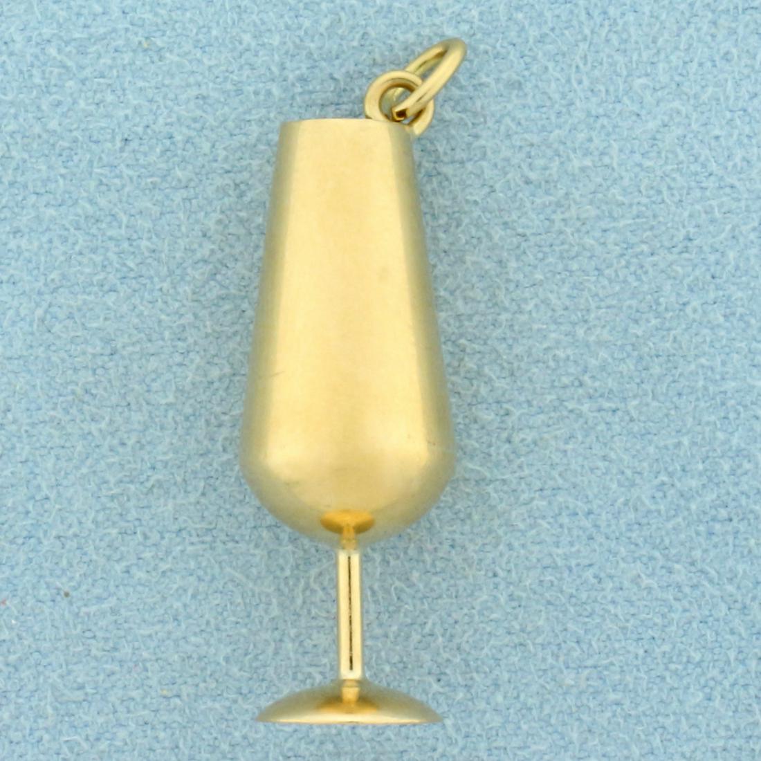 Chalice Pendant in 14K Yellow Gold: In 14K Yellow Gold. 1 1/4 inch long. 3/8 inch wide. 2.5g