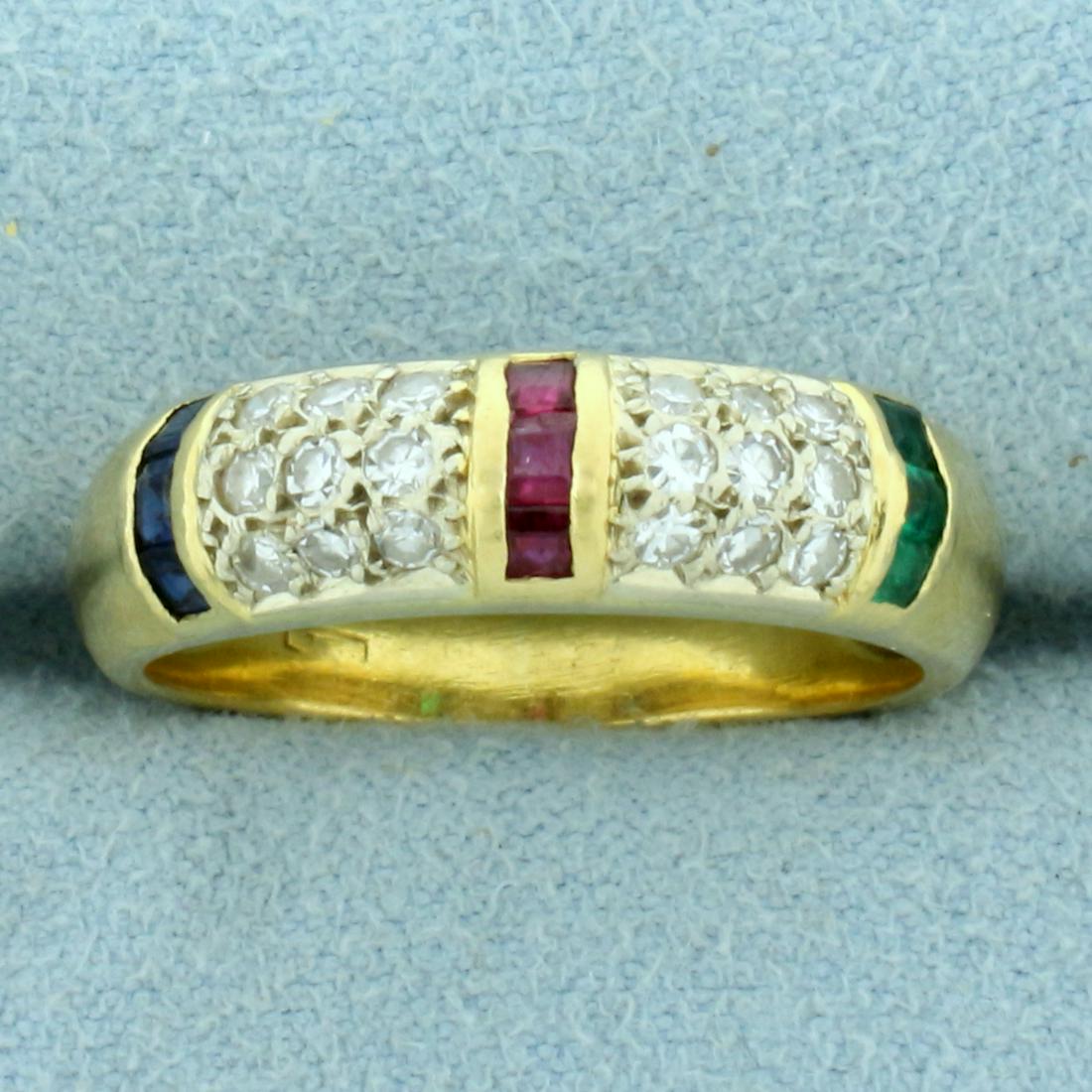 Emerald, Ruby, Sapphire, and Diamond Band Ring in 18K Yellow Gold: In 18K Yellow Gold. Contains three high quality natural 2mm princess cut Emerald, Ruby, and Sapphire gemstones, all with intense color and excellent clarity. Also contains eighteen high quality .02ct 