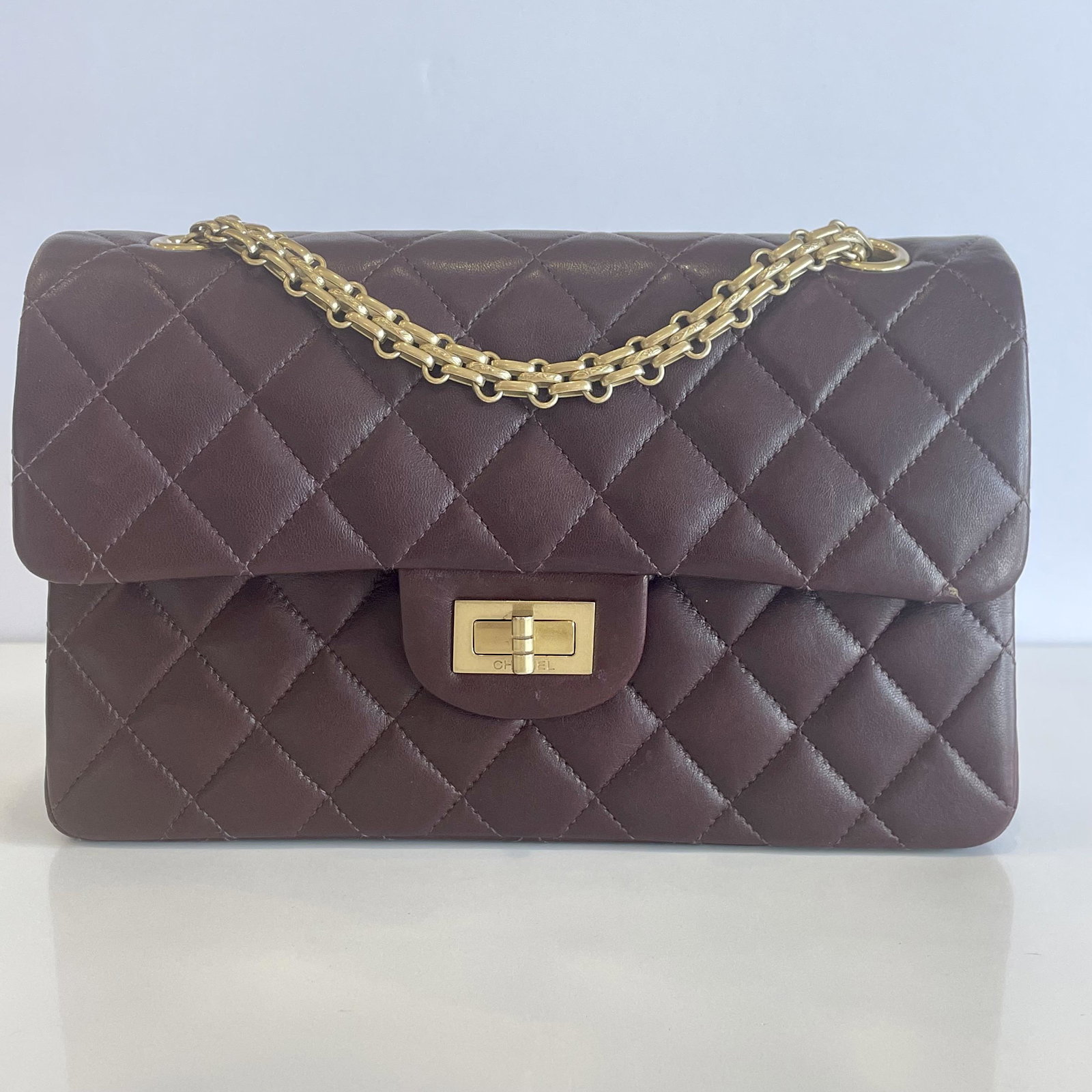 Chanel Oxblood Maroon 2.55 Reissue Classic Quilted Double Flap Bag: Guaranteed authentic with box, dustbag, authenticity card, and matching hologram serial number sticker inside bag. Excellent condition, only used a few times and then stored. Series 5******. Iconic 2.