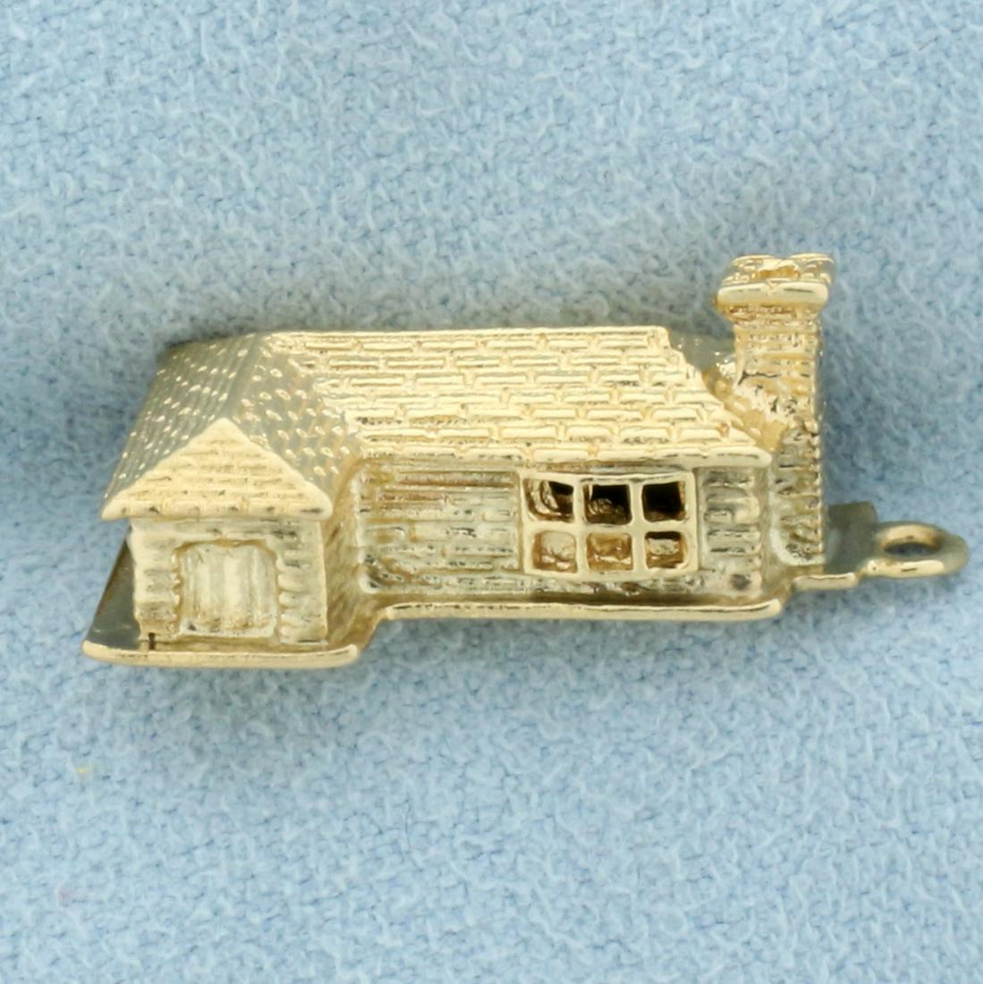 House Home Pendant in 14K Yellow Gold: In 14K Yellow Gold. 7/8 inch long including bale. 1/2 inch wide. 4.2g