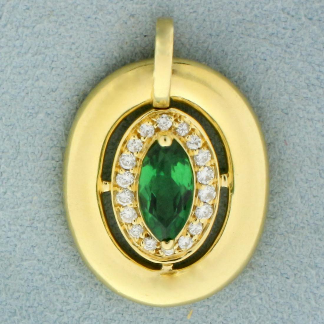 Tsavorite and Diamond Pendant in 18K Yellow Gold: In 18K Yellow Gold. Contains one high quality natural 1ct marquise cut Tsavorite gemstone with vibrant emerald color and excellent clarity. Also contains eighteen high quality 0.01ct round cut Diamond