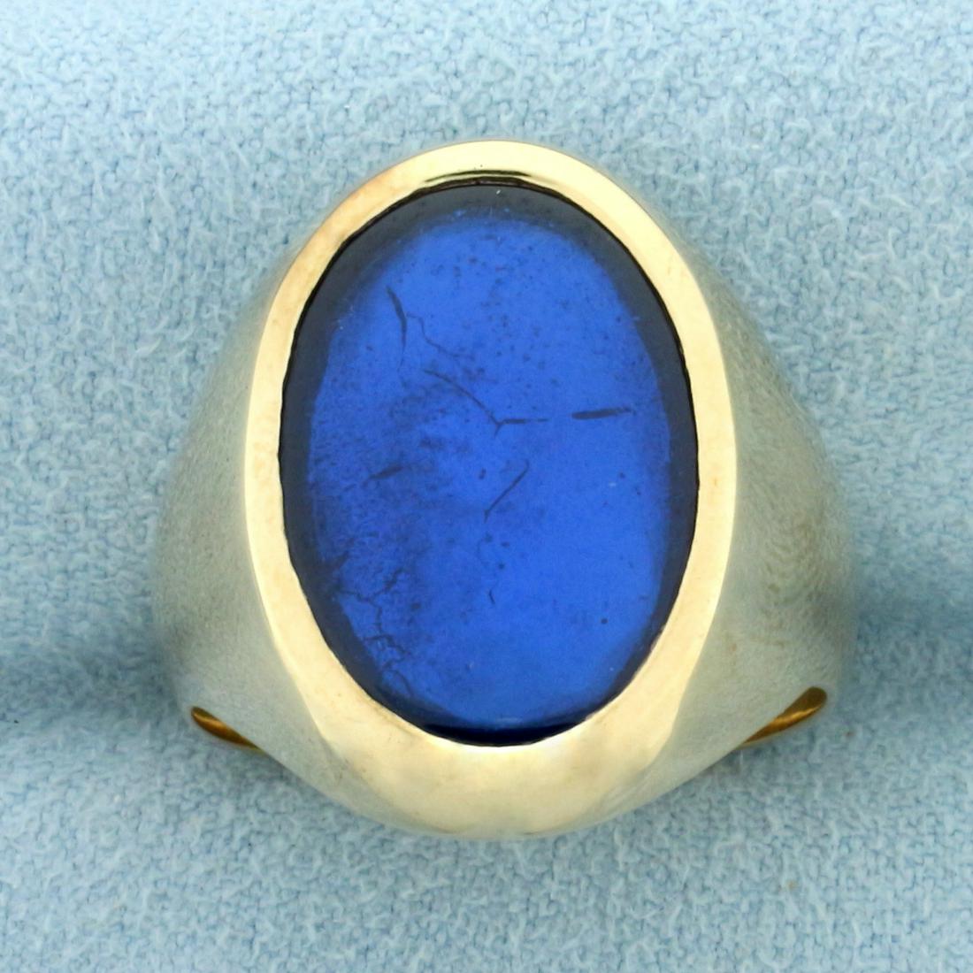 Mens Labradorite Ring in 14k Yellow Gold: In 14k yellow gold. Contains a 18x13mm high quality natural Labradorite gemstone with intense color and fantastic "sheen". Size 10. 12.9g.