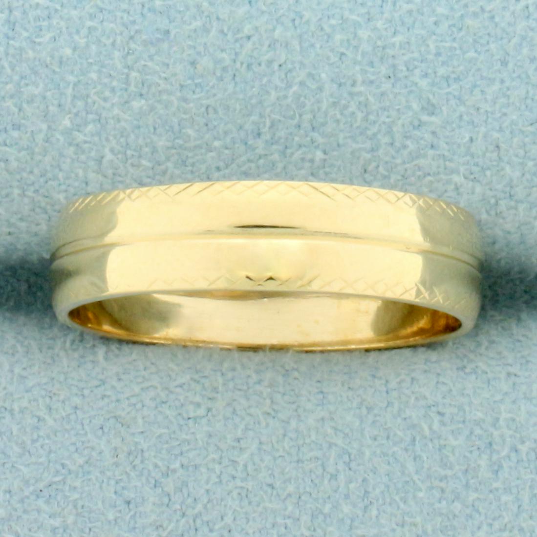 Vintage Wedding Band Ring in 14K Yellow Gold: In 14K Yellow Gold. Size 8 1/4, 5.0mm wide. 3.1g.
